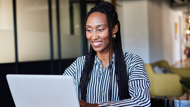 Female working in an office at a laptop